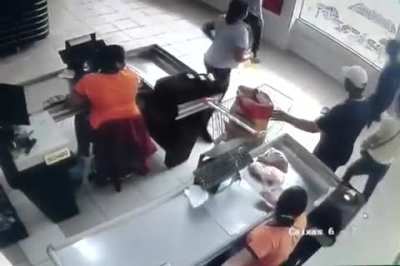 Dude puts meat inside a bag of coal