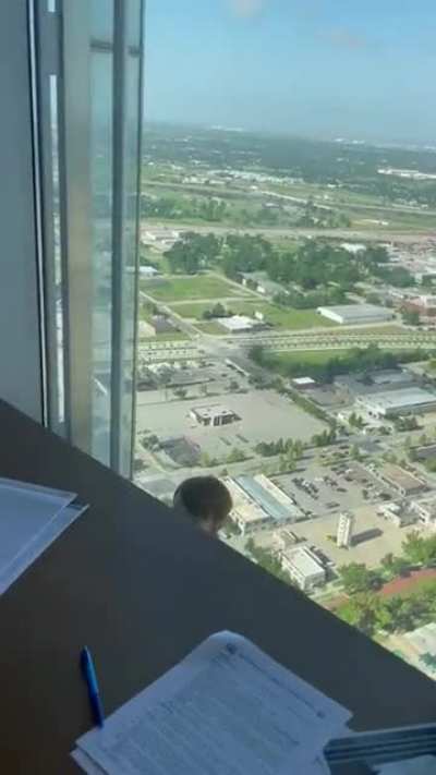 41 floors up and he is NOT washing windows.