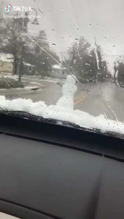 Snowman on the hood