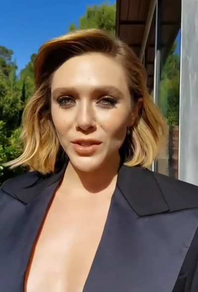 Elizabeth Olsen showing off lots of cleavage