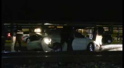 Car Stuck on Tracks Hit by Cargo Train