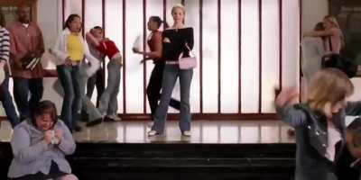Regina George watches the mayhem she started.