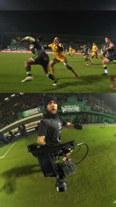 Rugby cameraman chases players