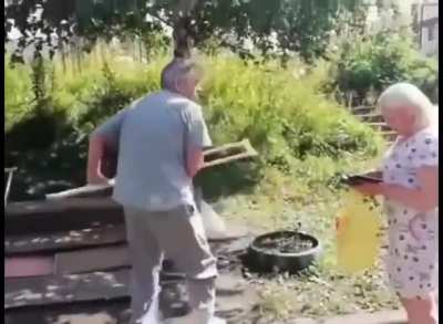Old man hits old woman with a crutch after arguing with her