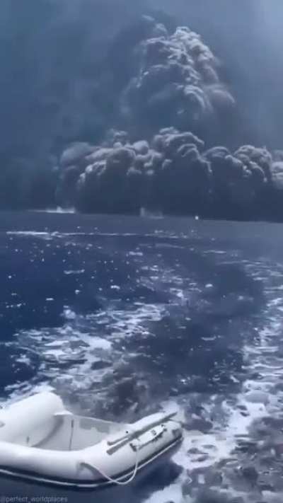 Sailing away from a volcanic eruption in Italy