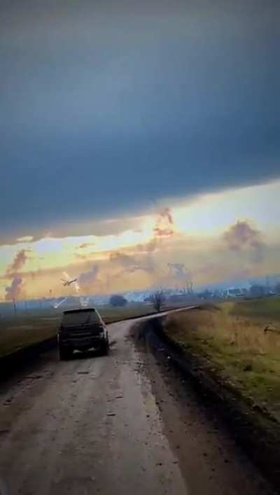 Ukrainian vehicles approaching Bakhmut with UA helis operating at low level