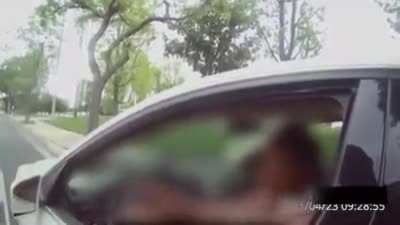 woman pulled over for using phone while driving