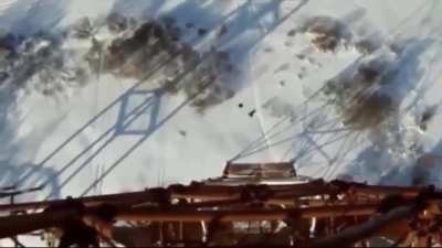 Base jumper's 120-metre 'death' plunge after parachute fails to open... but SURVIVES