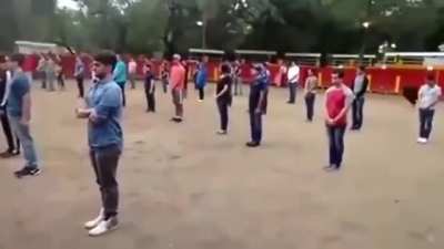 Teacher shows that a bull in a square of people doesn’t attack unless threatened— the bull wins this moral argument
