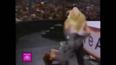Lita was so confident only to be strangled by Trish later on by her sweater and dragged up the ramp!