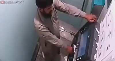 This guy breaking open an ATM