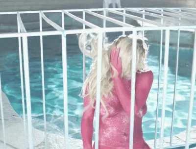 Britney Spears in red glitter body paint, 2016
