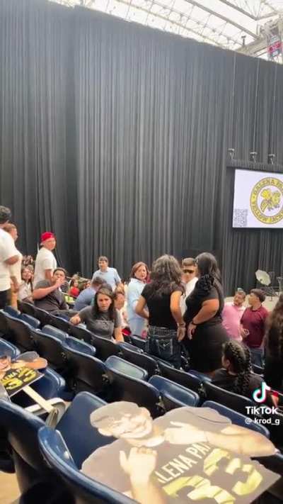 Don’t try and open an umbrella during an indoor graduation event or grandma WILL snatch your shit