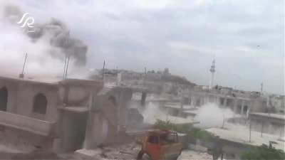 SyAAF helicopter dropping dumb bombs on Opposition held Talbiseh, Homs - 5/3/2015