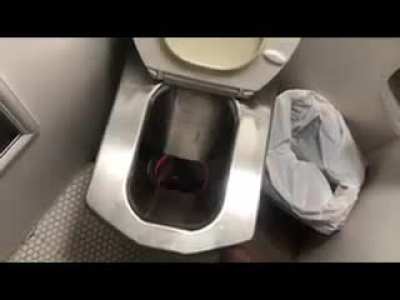 Toilet on a river houseboat