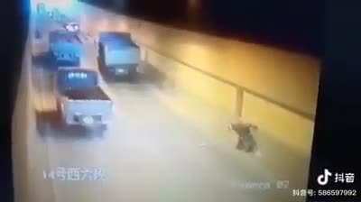 man gets ran over by tire.