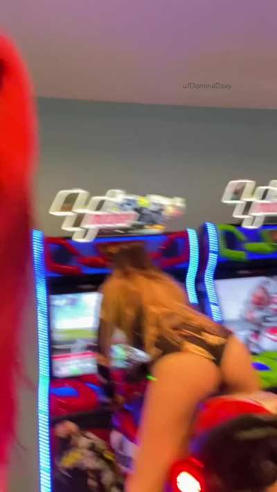 My girlfriend just had to get a lick in at the arcade