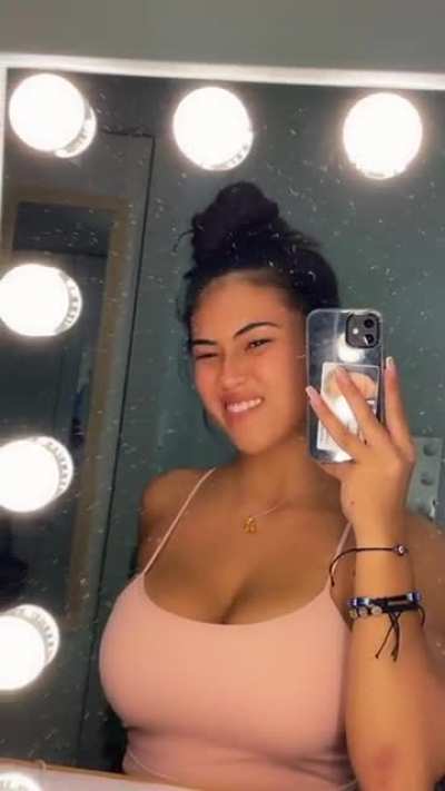 Bet she's imagining all the dicks getting hard staring at her massive jugs...