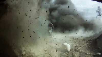 Footage of artillery shells landing meters away 
