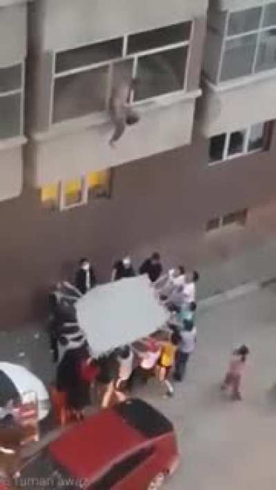 Group saves a man from burning apartment.