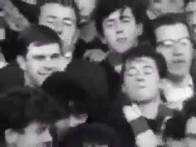 Liverpool supporters sing 