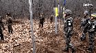 North & South Korean Soldiers Shaking Hands at the Border