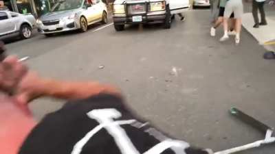 Trump supporters attack anti-fascist for filming license plates.