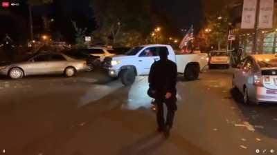 Progressive/anarcho-Democrats steal large American flag from right-wing driver's truck, attempt to steal his license plate