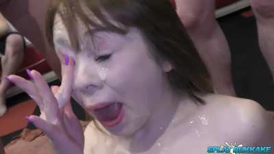 Lusty young Cherry English takes some huge dumps of bukkake cum in her face