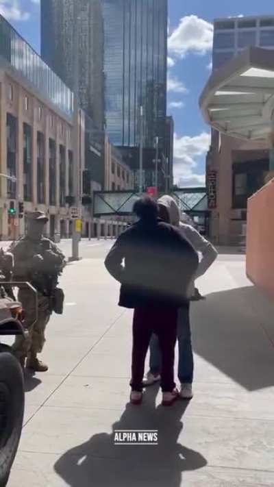 A maskless man in Minnesota harasses the National Guard and gets in their faces. A civilian intervenes
