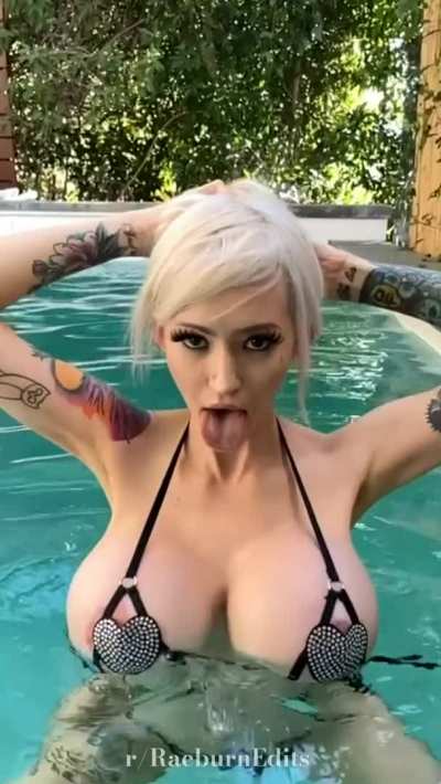 Slow-mo bikini bouncing in a pool