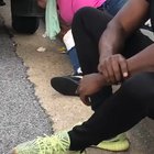 Woman sucking on tailpipe