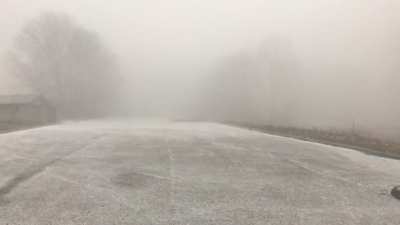 Video I took 2 years ago of a park parking lot in the middle of a blizzard