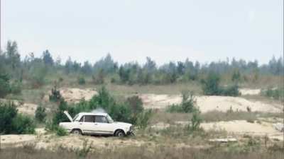 A 152mm shell bounces off of a car roof.