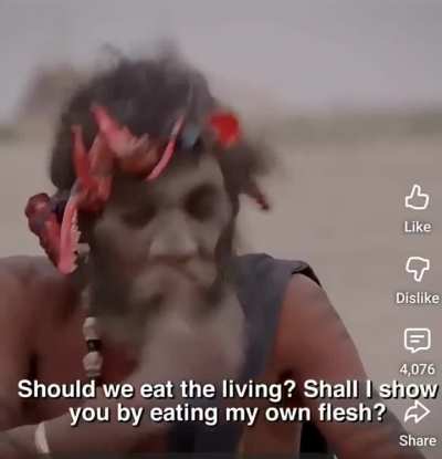 CNN reporter sits with cannibal