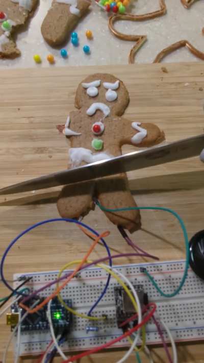 I made a Gingerbread Man that can feel pain