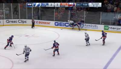 Nick Leddy yeets over the boards to avoid a too many men penalty