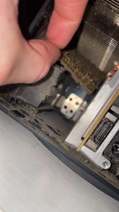 Guy cleaning out his series x