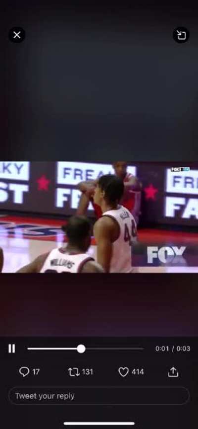 The player in the background looks like he’s sliding across the floor