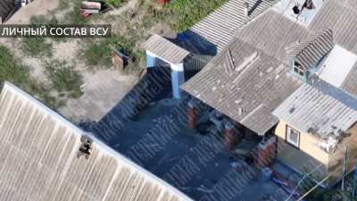 Ukrainian soldiers entering a building are engaged by Russian small arms fire and drone dropped grenades in Kursk