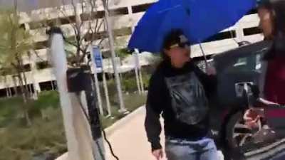 lady tries to claim someone else's tesla is hers.