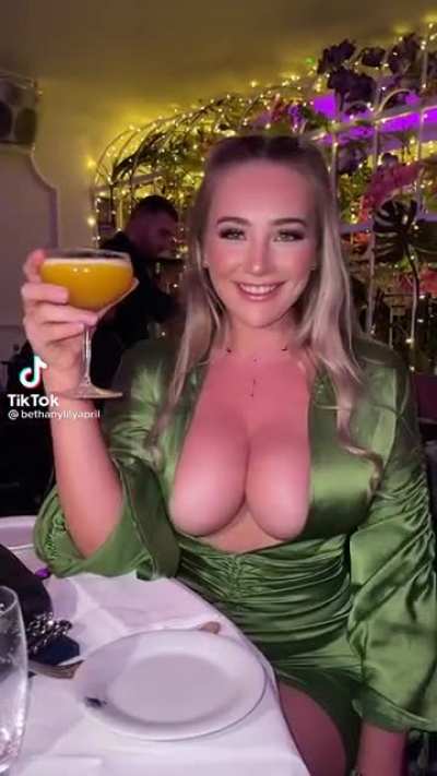 Green shirt with a bit of cleavage