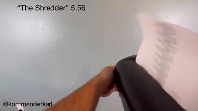 Paper shredder reimagined as a light machine gun