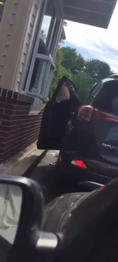 Karen screams at dunkin donuts employee and gets a face full of iced coffee.