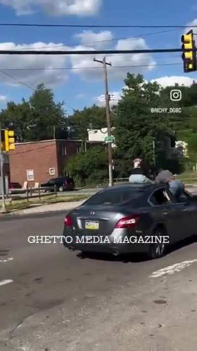 Twerking on top of a car