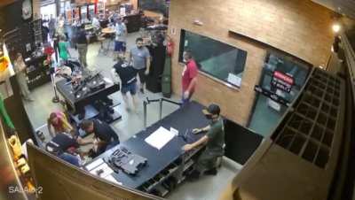 Man accidentally shoots his buddy in the stomach.