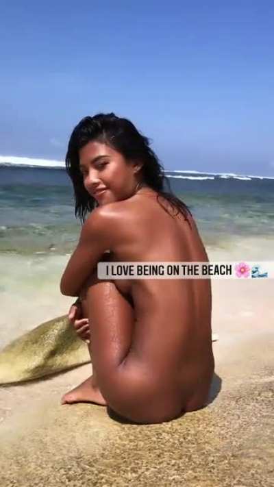 Naked on the beach
