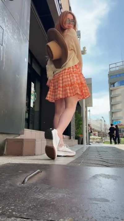 Doing a twirl & showing off her legs in Japan (April 2023)