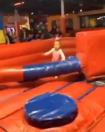 girl doesnt know that sticks will smash her head.