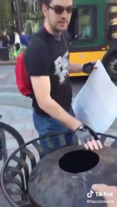 Proud Boy attempts to destroy Pride Sign